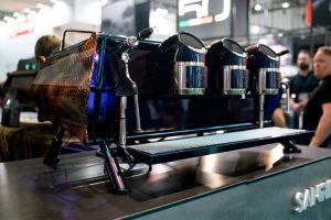 Sanremo Cafe Racer 3 groups Commercial Espresso Machine in black at coffee industry Sanremo booth
