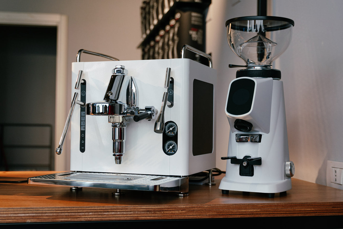 Sanremo CUBE espresso machine for home baristas in white, combined with Sanremo white Allground coffee grinder, an elegant design for prosumers