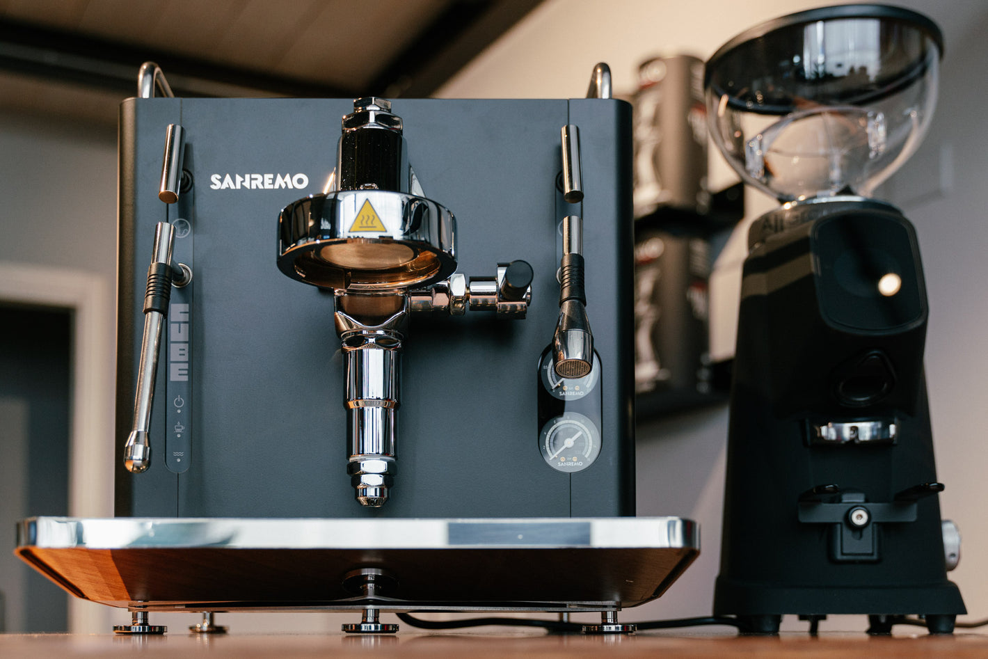 Sanremo CUBE espresso machine for home baristas in black, combined with Sanremo black Allground coffee grinder, front view