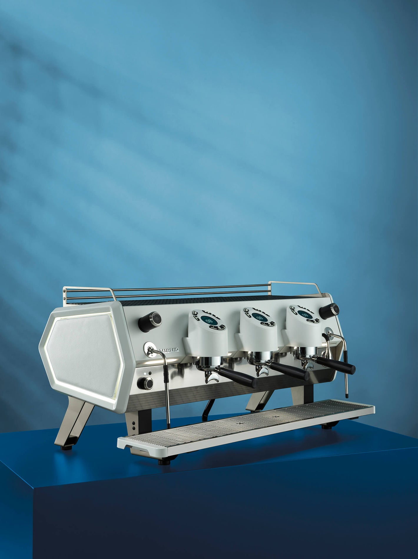 Sanremo D8 3 Group espresso machine in white, blue background