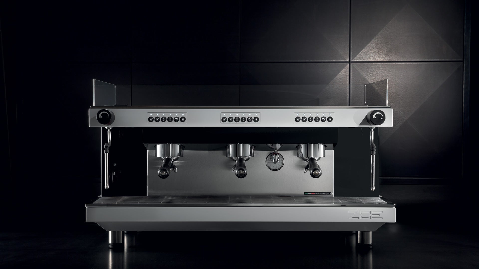 Sanremo Zoe coffee espresso machine 3 groups in white full width and black background